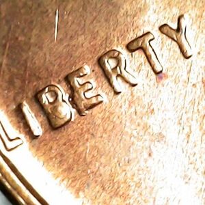 Exquisite 1957 D Error Penny